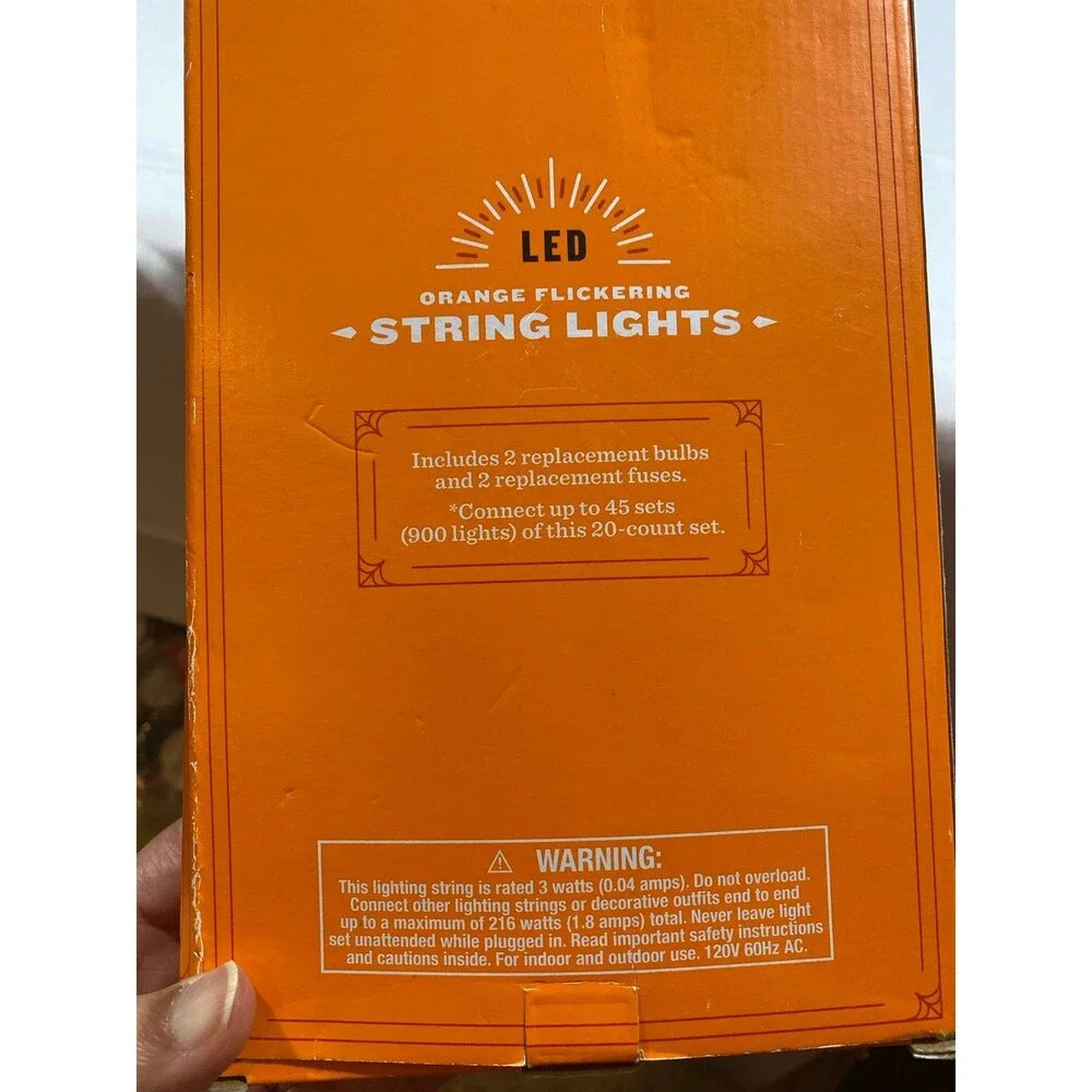 Set of 20 Orange flickering LED String Lights NIB 7ft 8” New in box.